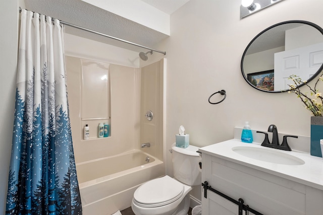 full bathroom featuring shower / tub combo with curtain, vanity, and toilet