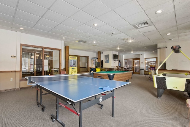 recreation room featuring pool table, a paneled ceiling, and french doors