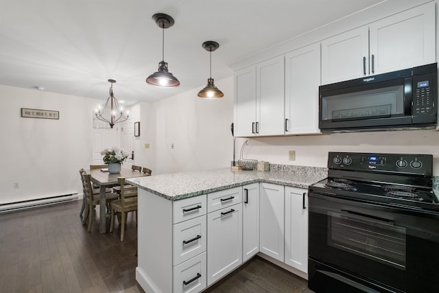 kitchen with hanging light fixtures, a baseboard heating unit, white cabinets, and black appliances