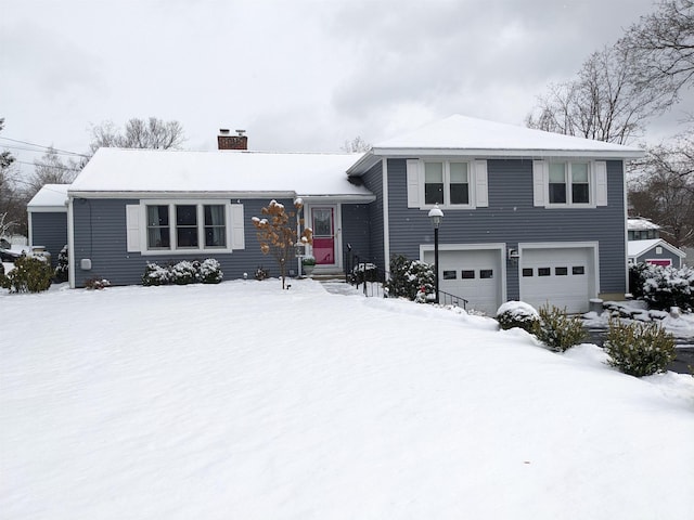 split level home with a garage