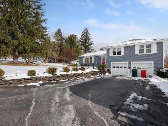 view of front of house with a garage