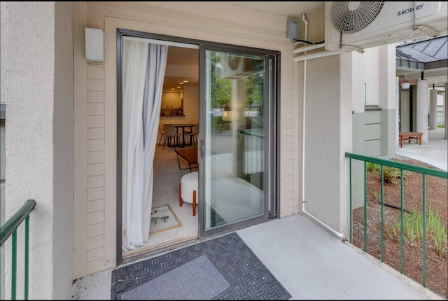 entrance to property featuring a balcony