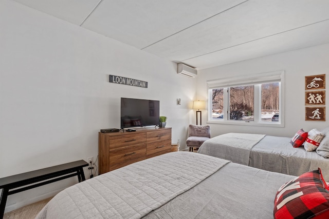 bedroom featuring carpet floors and a wall unit AC