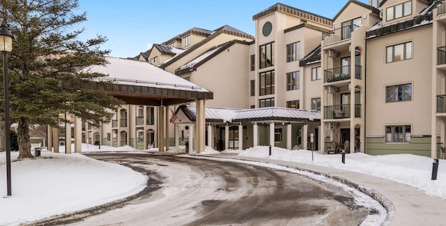 view of snow covered property