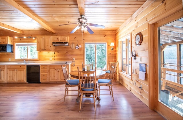 dining area with beamed ceiling, wood ceiling, and light hardwood / wood-style flooring