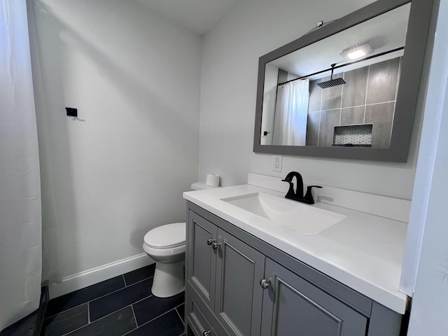 bathroom featuring vanity, tile patterned floors, toilet, and a shower with shower curtain