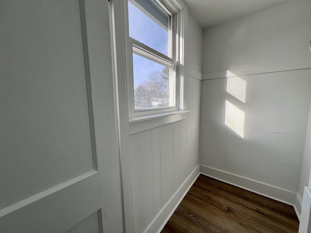 interior space with dark hardwood / wood-style flooring