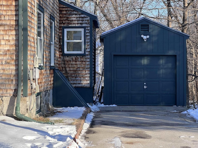 view of snow covered garage