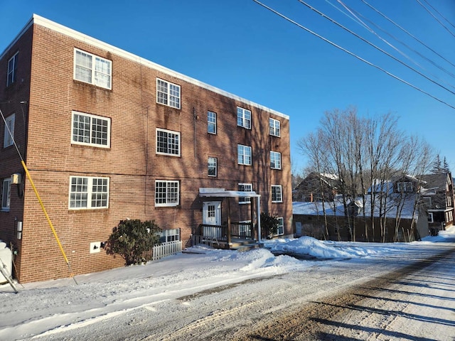 view of snow covered property