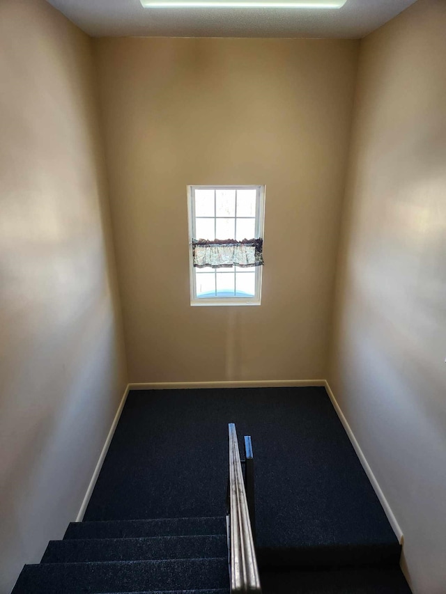 empty room with baseboards