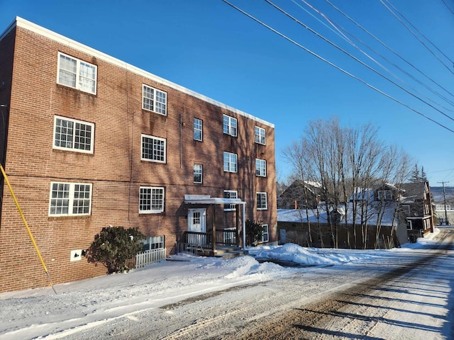 view of snow covered building