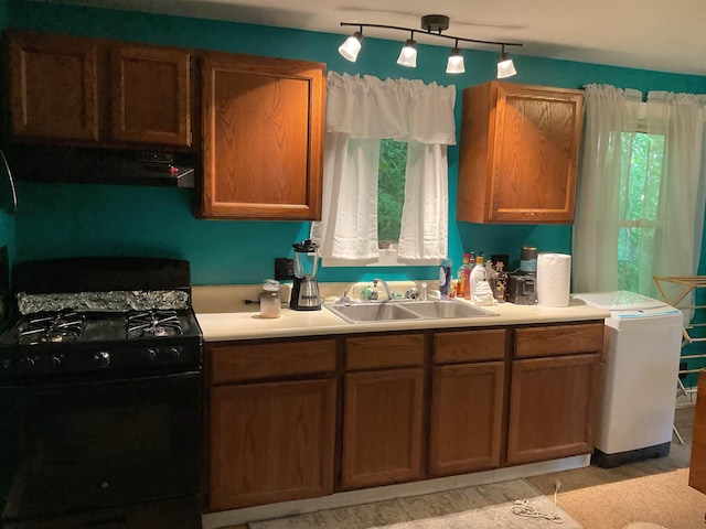 kitchen featuring sink and black range with gas stovetop