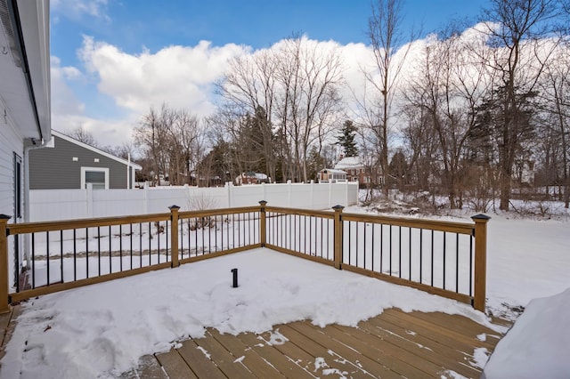 view of snow covered deck