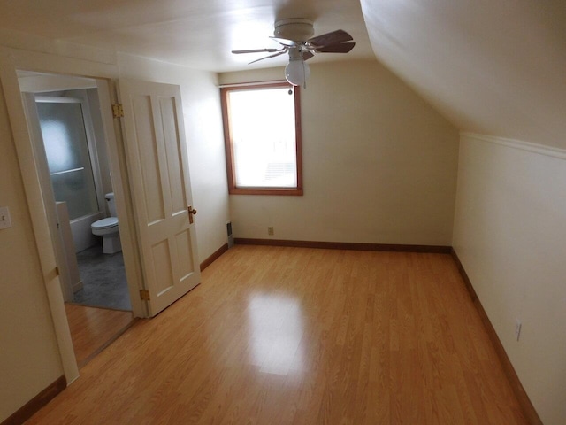 bonus room featuring ceiling fan, lofted ceiling, and light hardwood / wood-style floors