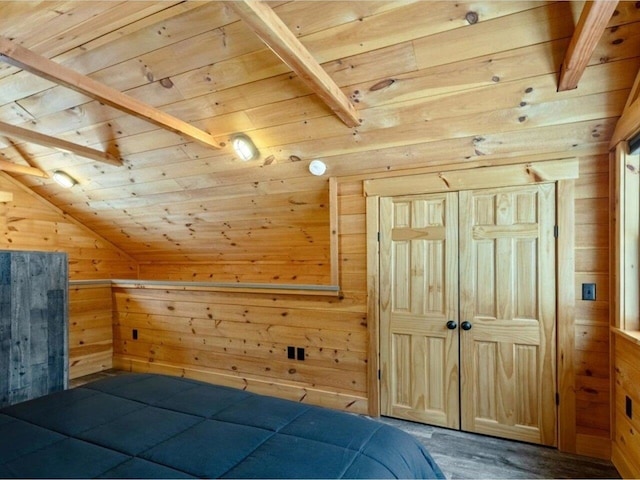 unfurnished bedroom with lofted ceiling with beams, wood ceiling, and wood walls