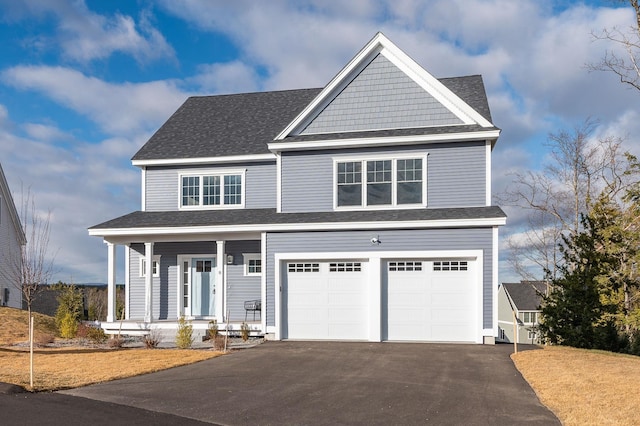 craftsman-style house with a garage and covered porch