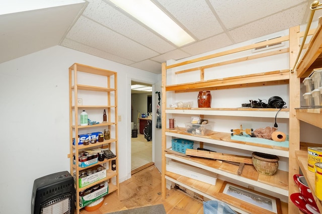 storage room featuring heating unit