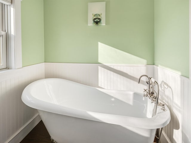 bathroom featuring a bath