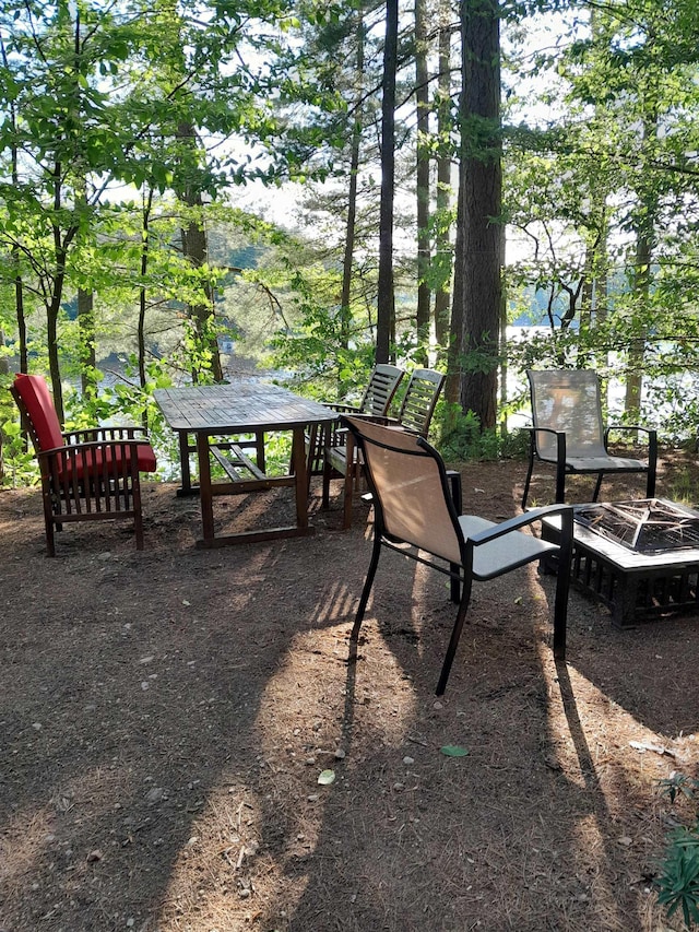 exterior space with a fire pit