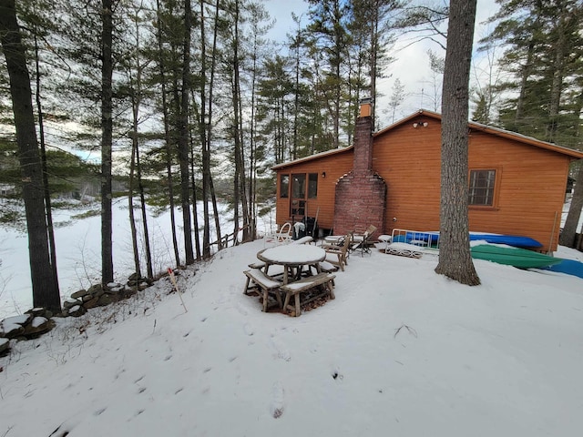 view of snow covered property