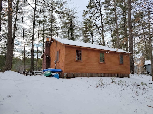 view of snow covered property