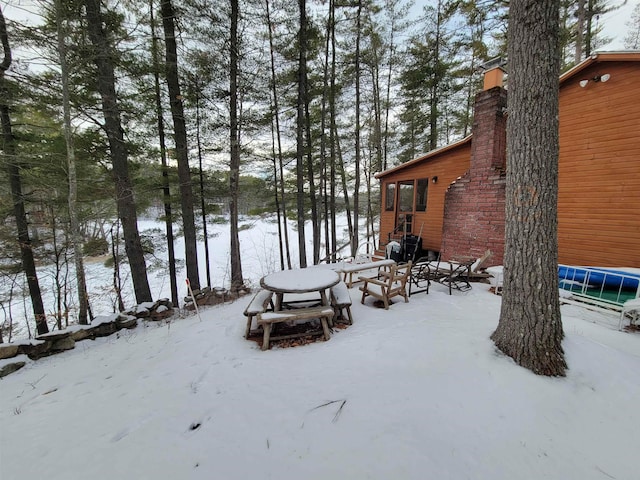 view of yard covered in snow