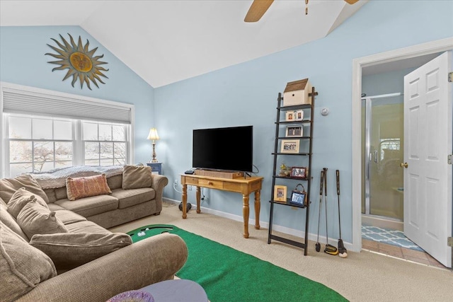 carpeted living room with vaulted ceiling and ceiling fan