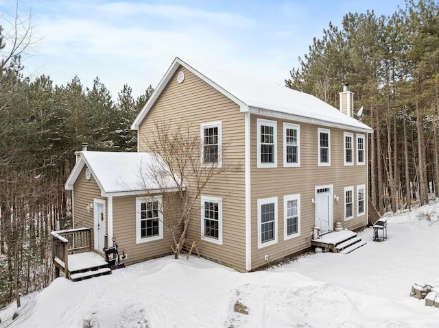 view of snow covered property