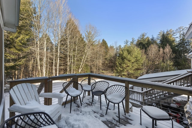 view of snow covered deck