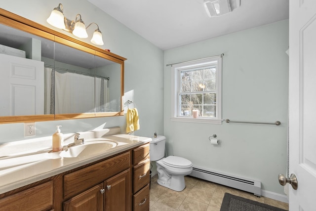 bathroom with tile patterned floors, toilet, baseboard heating, vanity, and curtained shower