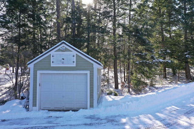 view of snow covered garage