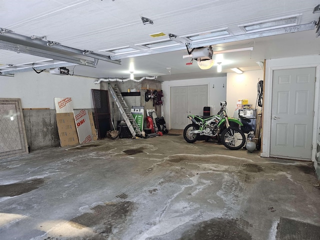 garage featuring a garage door opener