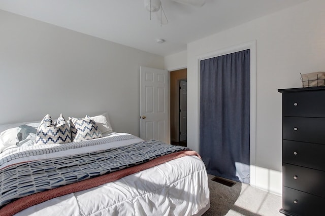 carpeted bedroom featuring ceiling fan