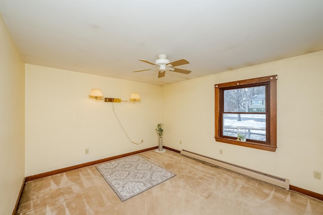 unfurnished room with a baseboard radiator, carpet, and ceiling fan