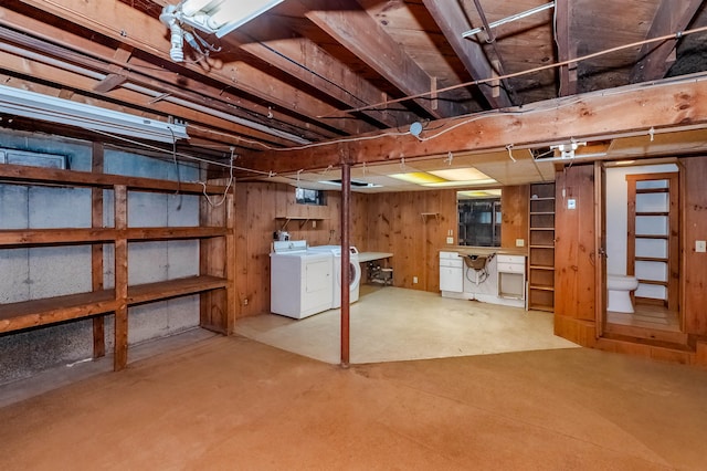 basement featuring washer and clothes dryer