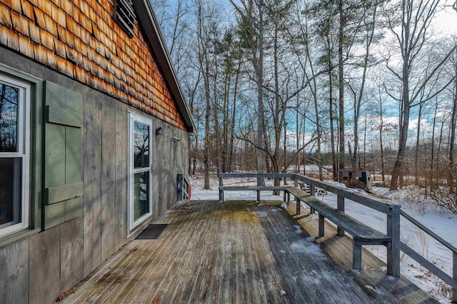 view of snow covered deck