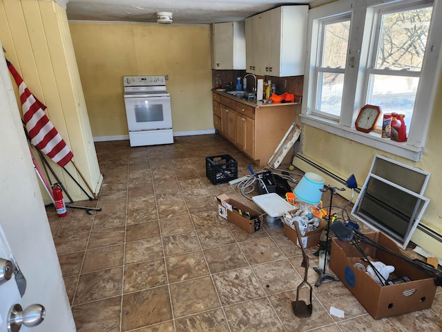 kitchen with a baseboard heating unit, sink, dark tile patterned flooring, and white electric range oven