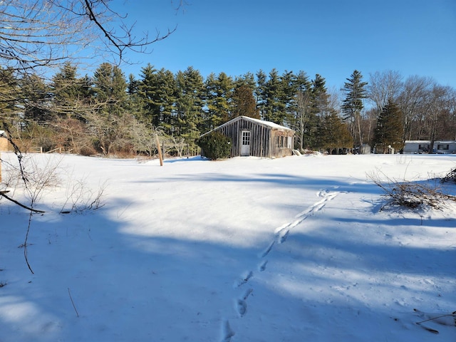 view of yard covered in snow