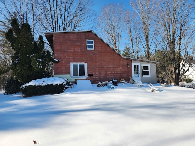 view of snow covered house