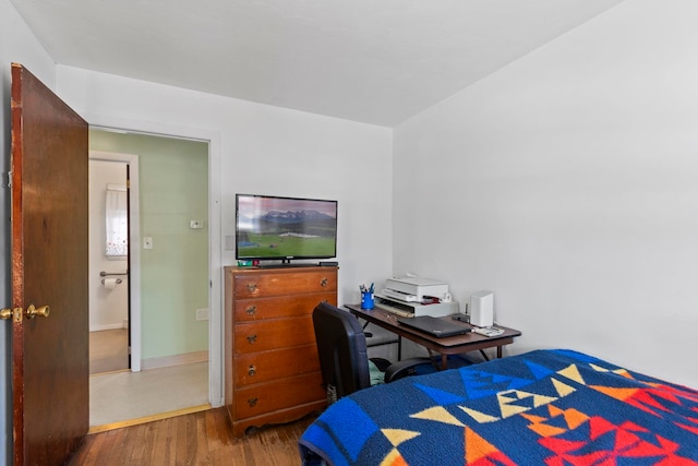 bedroom featuring wood-type flooring