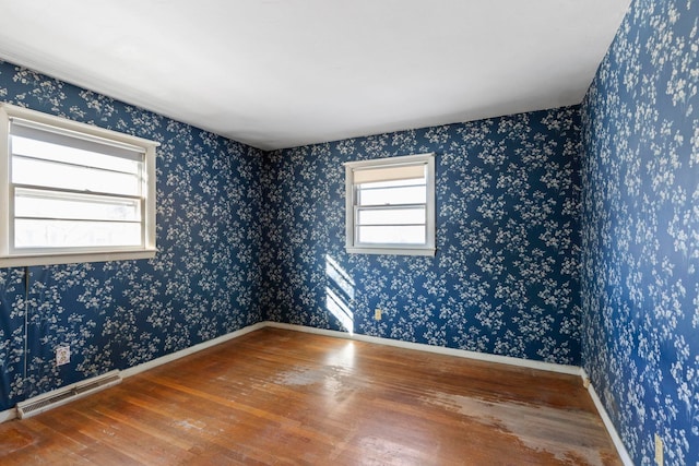 spare room featuring hardwood / wood-style flooring