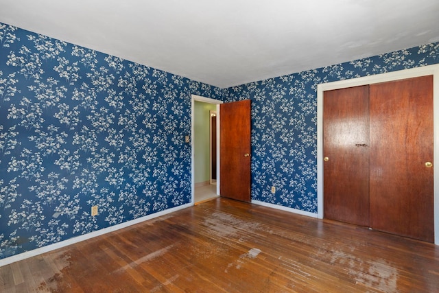 empty room featuring hardwood / wood-style flooring