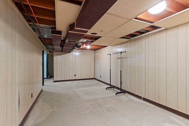 basement with wood walls