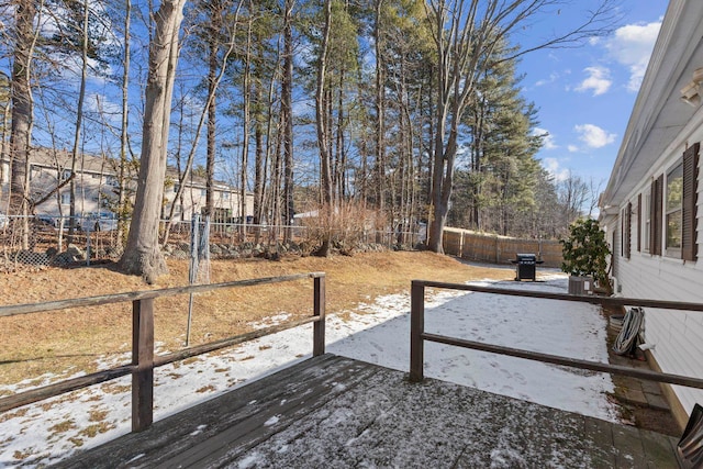 50 Suzanne Dr, Portsmouth, NH 03801 - snow covered deck featuring a fenced backyard and area for grilling