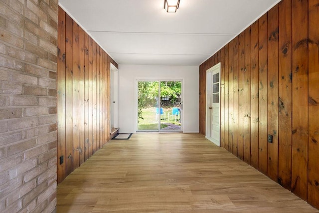50 Suzanne Dr, Portsmouth, NH 03801 - hallway featuring wood walls and light wood finished floors