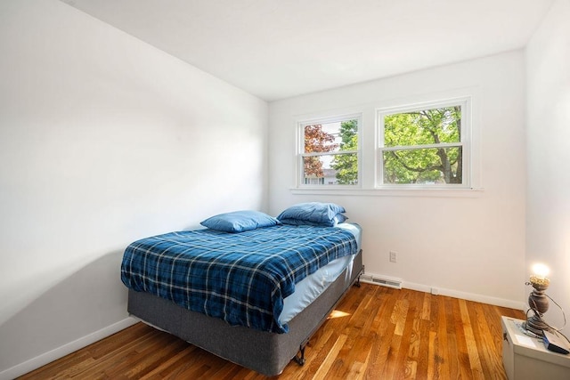 50 Suzanne Dr, Portsmouth, NH 03801 - bedroom with baseboards and wood finished floors