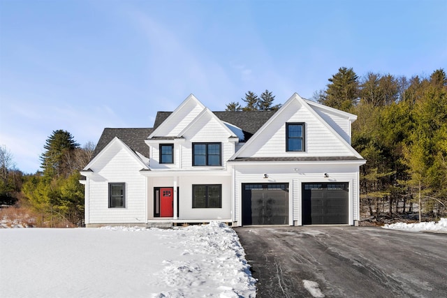 modern farmhouse with a garage