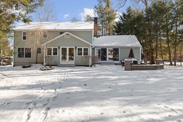 view of snow covered property