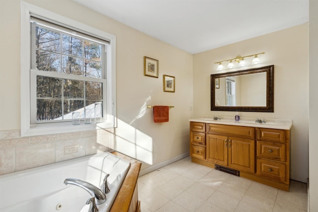 bathroom with a bathing tub and vanity