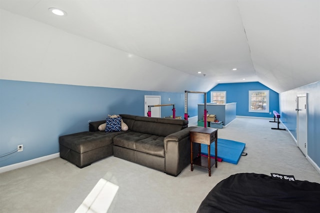 living room featuring lofted ceiling and light colored carpet